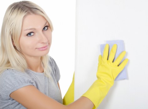 Deep cleaning of kitchen appliances during move-out cleaning in Richmonduponthames